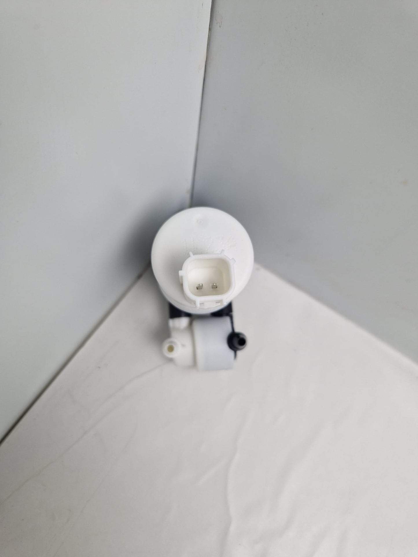 Windshield washer pump SEIM Z113959, FOMOCO E23VB, FEBI 103391  (Request price)