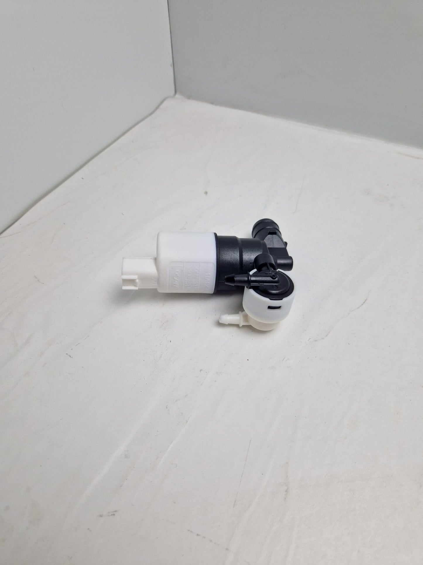 Windshield washer pump SEIM Z113959, FOMOCO E23VB, FEBI 103391  (Request price)