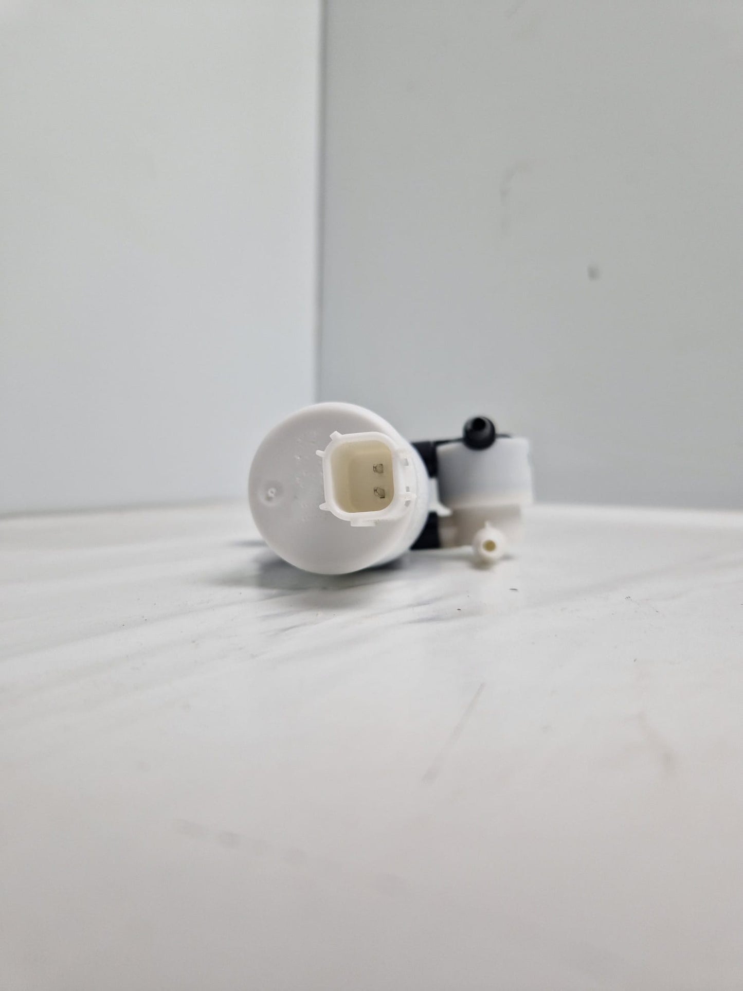 Windshield washer pump SEIM Z113959, FOMOCO E23VB, FEBI 103391  (Request price)