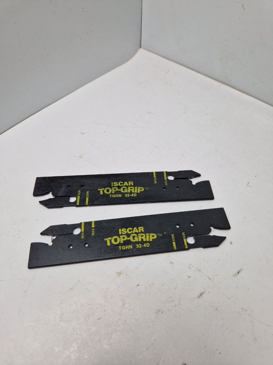 ISCAR  TOP-CRIP TGHN 32-4D Double-ended blades carrying TOP-GRIP utility grooving and turning inserts.  (Request price)