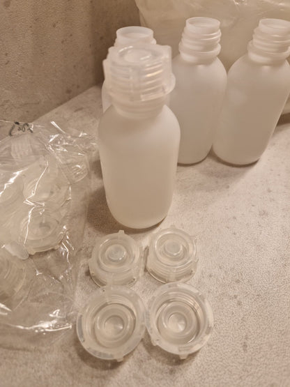 Kautex™ medium-wide neck bottle made of high-density polyethylene, with caps, 100 ml, 19 mm  (Request price)