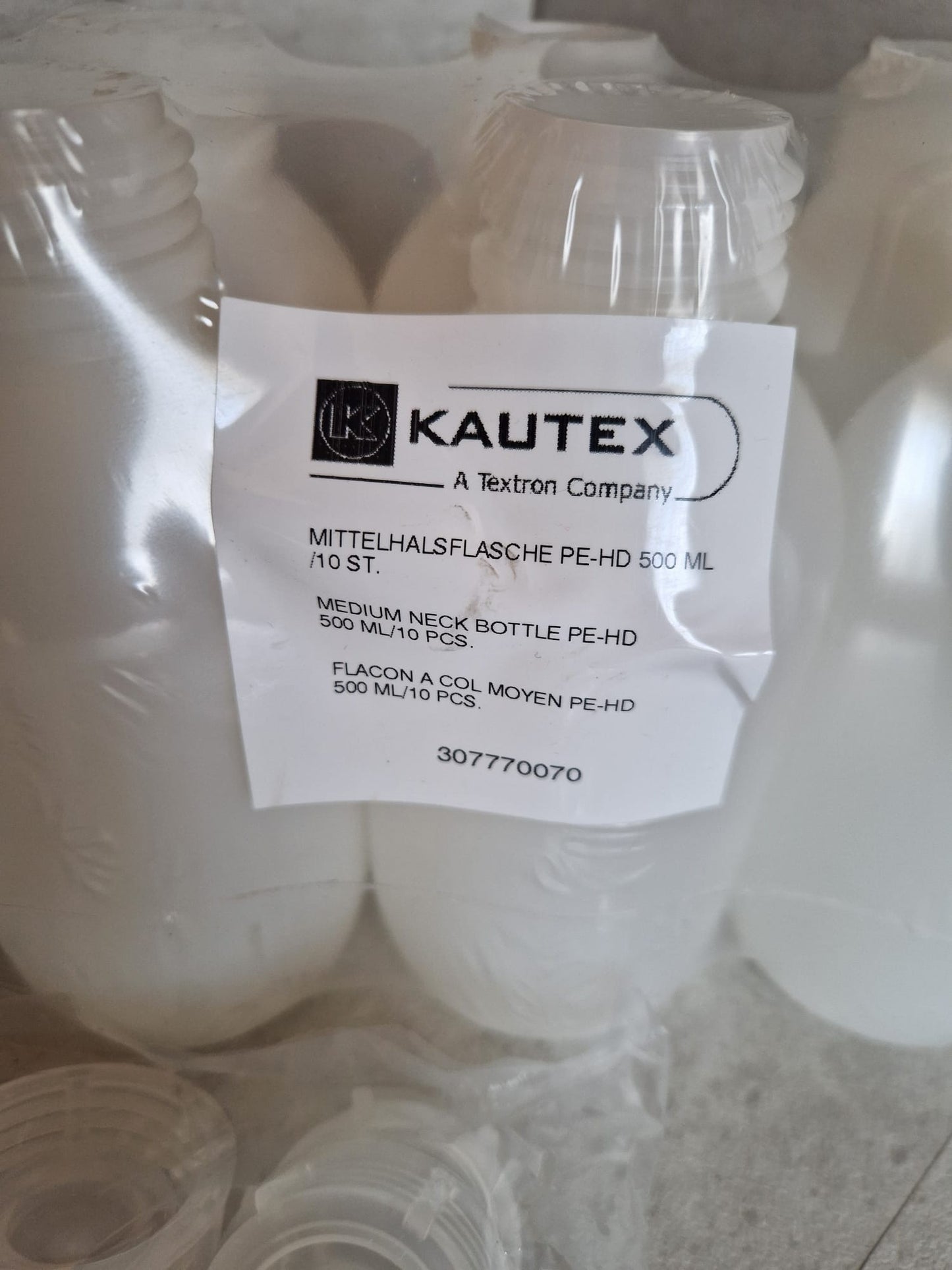 Kautex™ medium-wide neck bottle made of high-density polyethylene, with caps, 500 ml, 30.8 mm  (Request price)