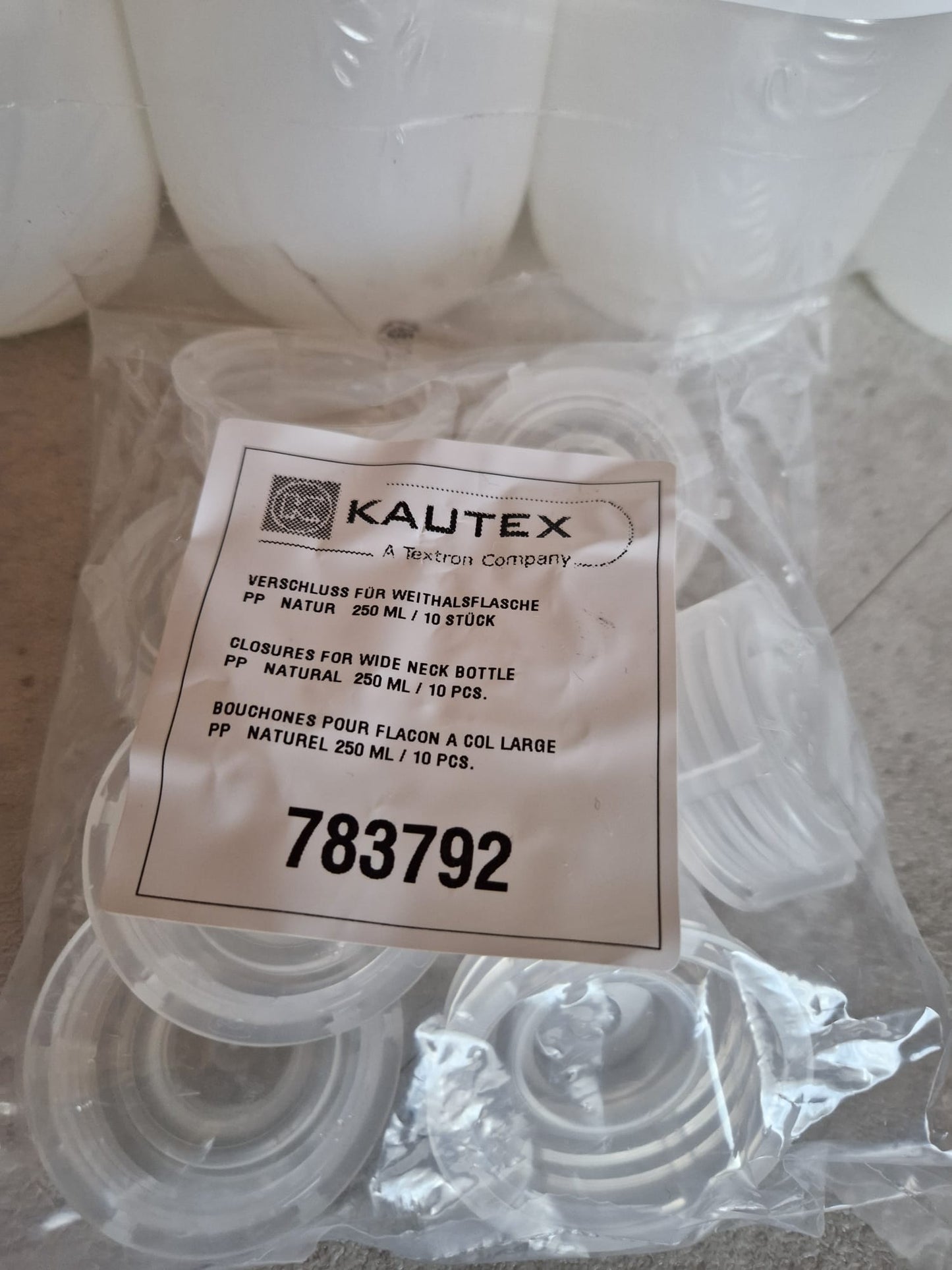 Kautex™ medium-wide neck bottle made of high-density polyethylene, with caps, 500 ml, 30.8 mm  (Request price)