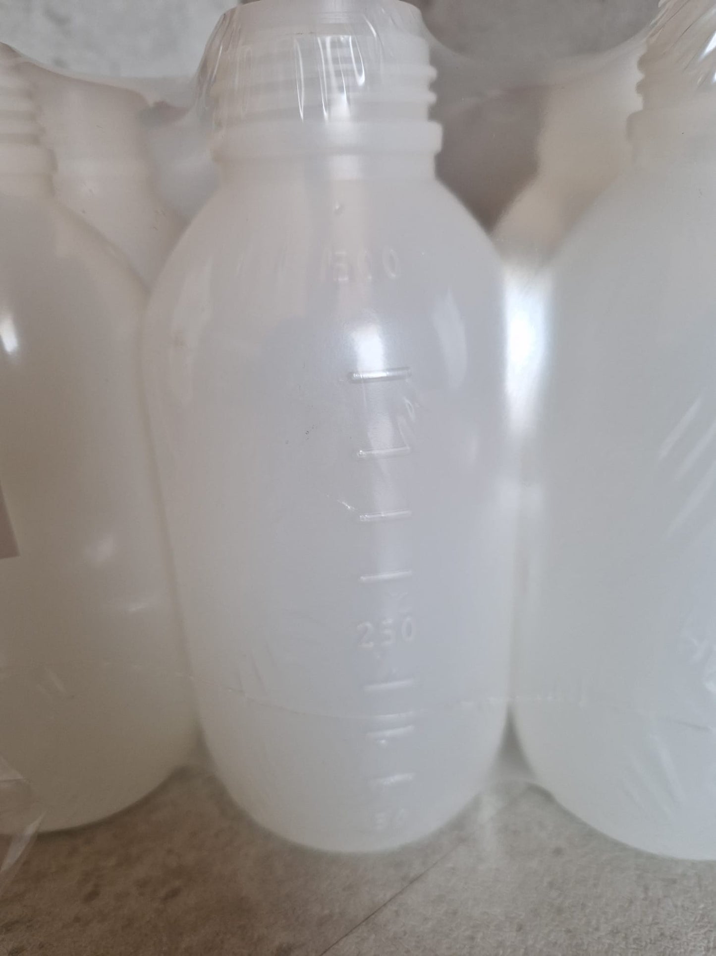 Kautex™ medium-wide neck bottle made of high-density polyethylene, with caps, 500 ml, 30.8 mm  (Request price)