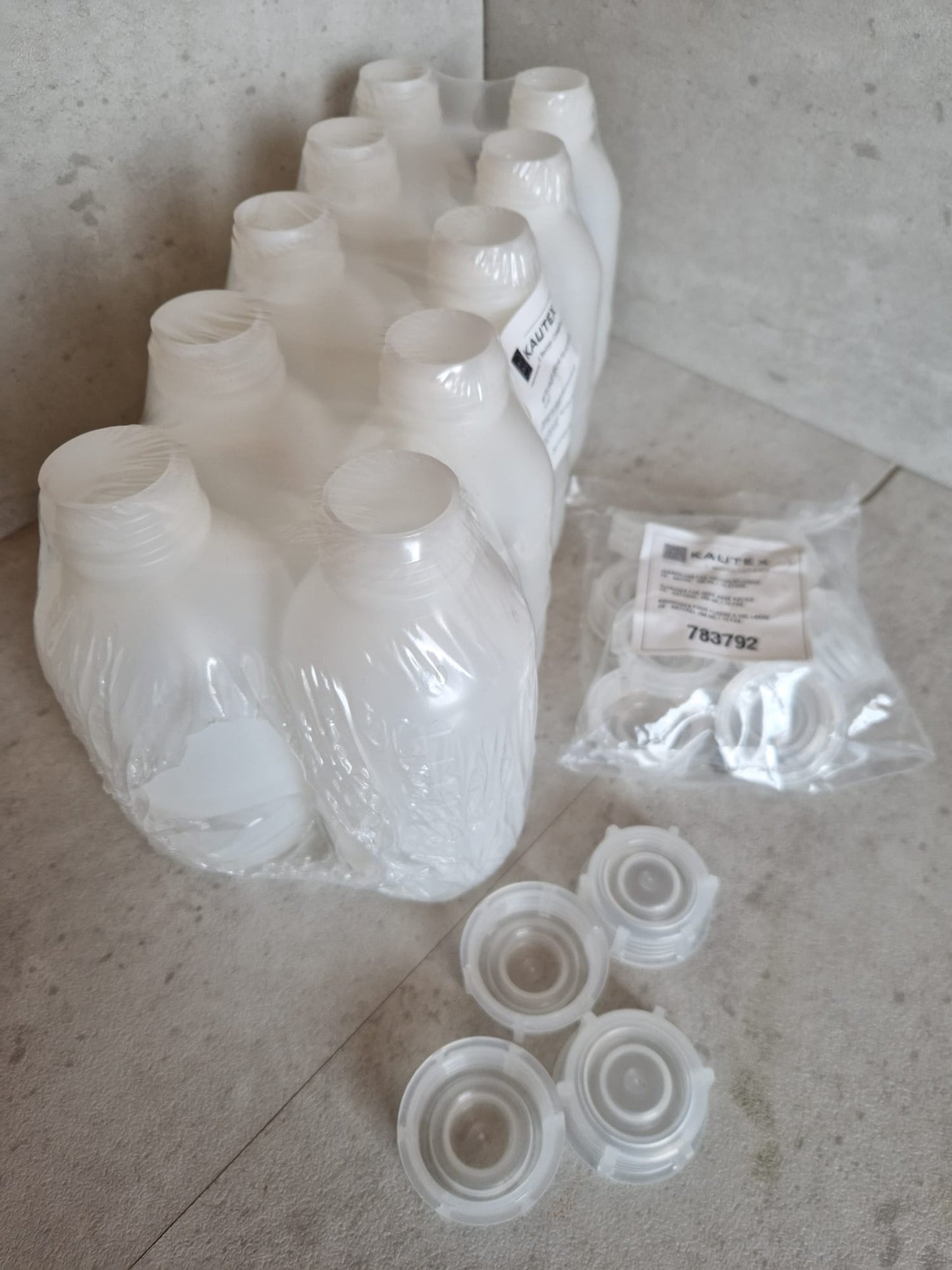 Kautex™ medium-wide neck bottle made of high-density polyethylene, with caps, 500 ml, 30.8 mm  (Request price)